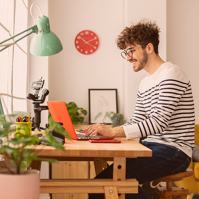 Man typing on laptop